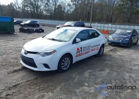 2016 Toyota Corolla L z USA, uszkodzony, nr VIN 2T1BURHE6GC735115
